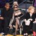 Nicki Minaj flashes cleavage in sexy black leather ensemble at Los Angeles Lakers game.