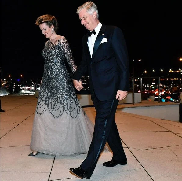 Queen Mathilde wore a new embroidered dress by Natan. Princess Stephanie wore a new metallic embroidered gown by Oscar de la Renta