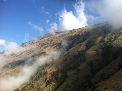 Mount Rinjani is visible from the heights of Plawangan Sembalun 2639 meters