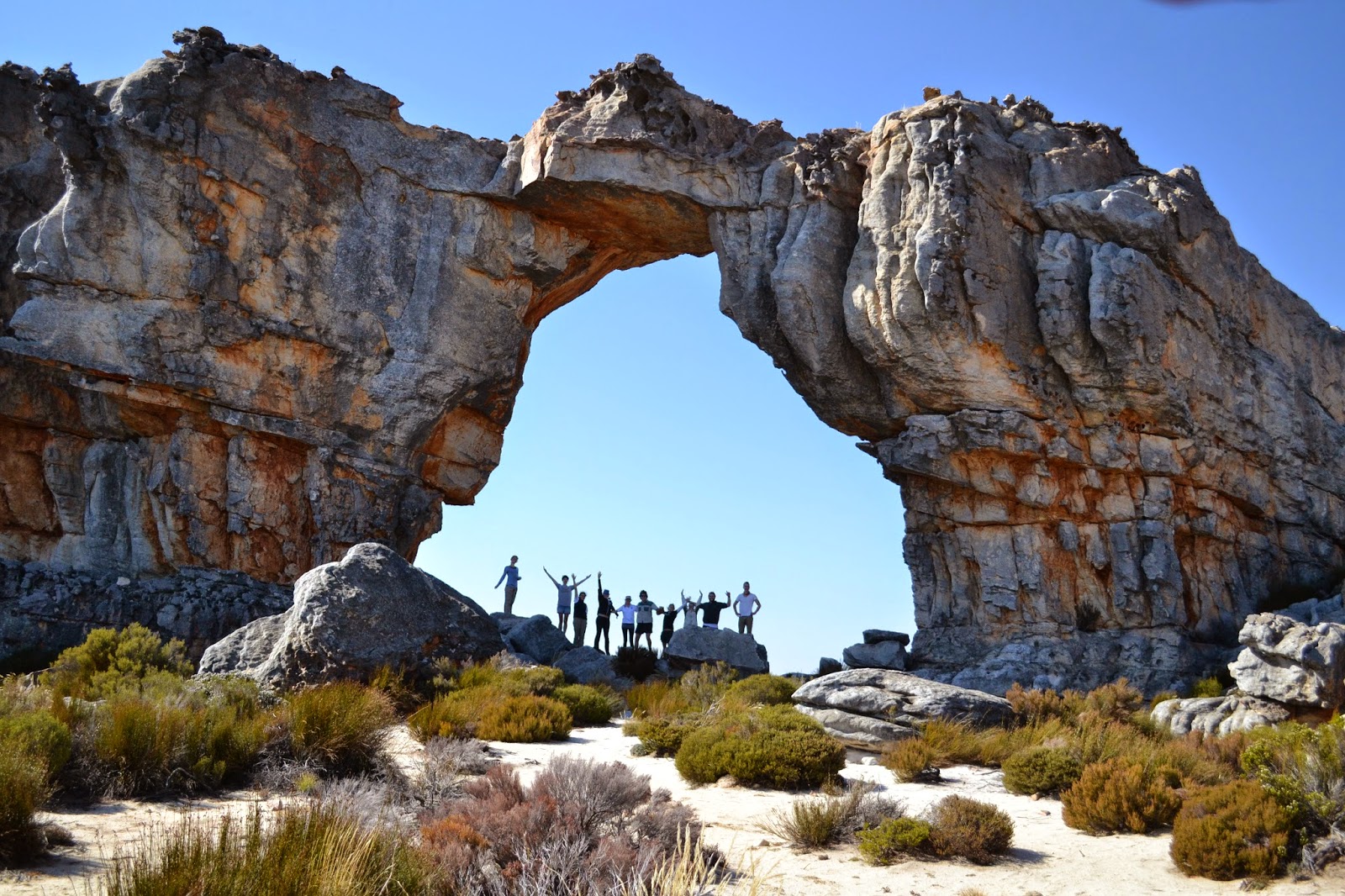 Wolfberg Arch with people underneath