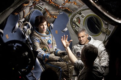 Sandra Bullock (Ryan Stone), George Clooney (Matt Kowalski) y Alfonso Cuarón