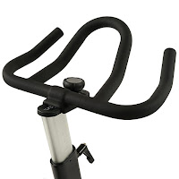 Fully adjustable handlebars on Sunny Health & Fitness SF-B1714 Evolution Pro Spin Bike, adjusts up/down and forwards/backwards