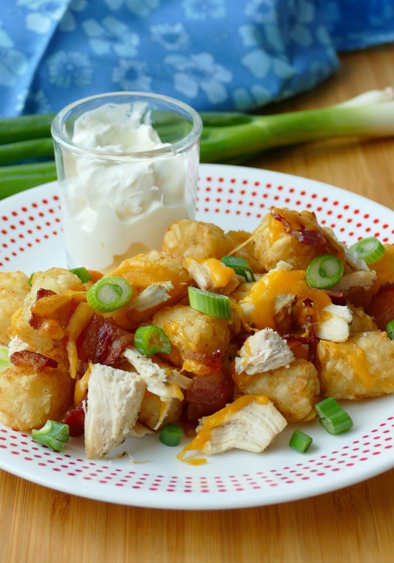 Cheesy Chicken and Bacon Tater Tots Recipe from Hot Eats and Cool Reads! This easy and delicious appetizer or dinner is kid approved and the adults love it too! Great for parties or any other occasion! 