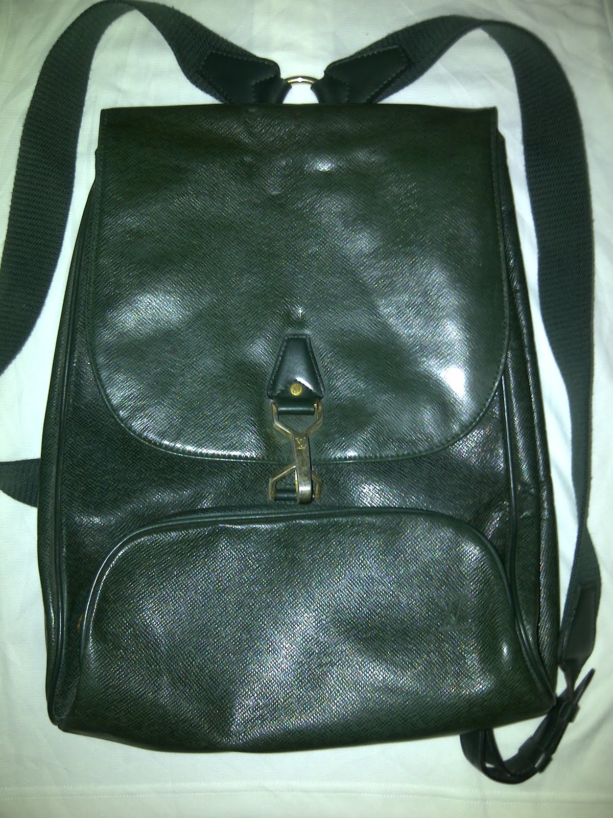 the scandalist: vintage louis Vuitton green epi leather backpack