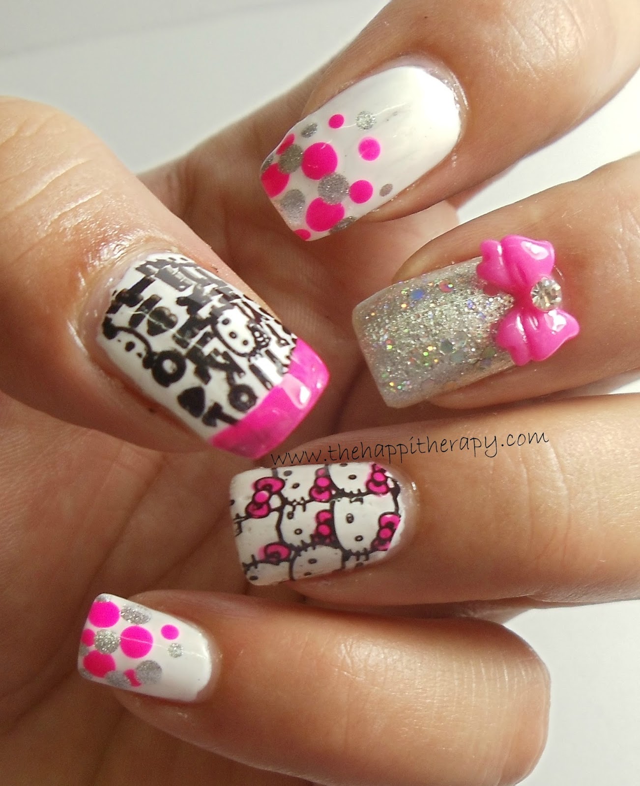 Manisha's FollowManimatters Hello Kitty Nail Art by Dhara from