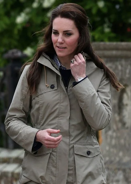 Kate Middleton wore Troy London Wax Parka, Jigsaw Cashmere Jumper, Zara Trousers, Penelope Chilvers boot, Kiki Lauren Earrings