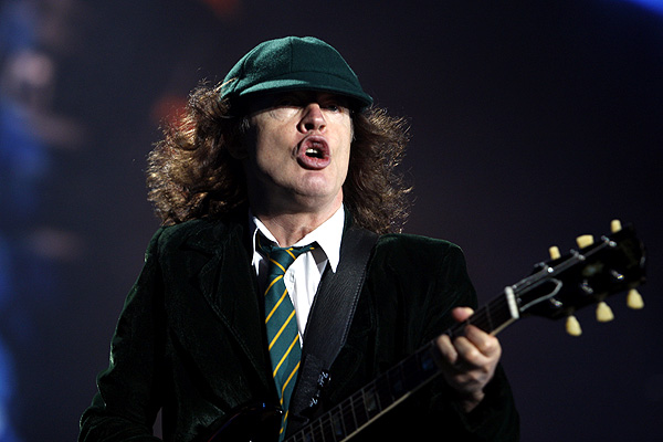 Why AC/DC Angus Young Plays Guitar Wearing Striped Neckties