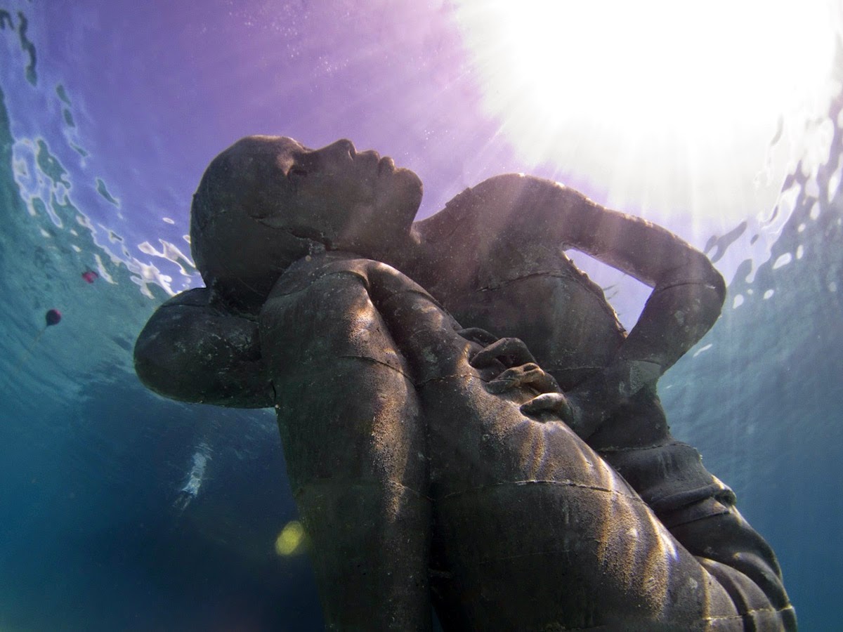 Ocean Atlas: A Massive Submerged Girl Carries the Weight of the Ocean
