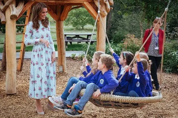 Kate Middleton wore Emilia Wickstead Aurora belted floral-print Swiss-dot cotton-blend seersucker dress and Monsoon fleur wedges