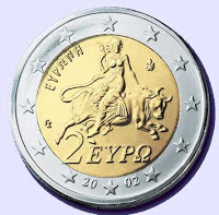 καὶ εἶδον γυναῖκα καθημένην ἐπὶ θηρίον