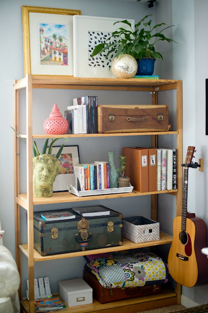 Styling a shelving unit that is both pretty and functional.