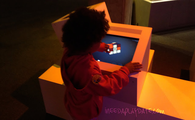 Solving a virtual Rubik Cube at Great Lakes Science Center this Summer #thisiscle | @mryjhnsn 