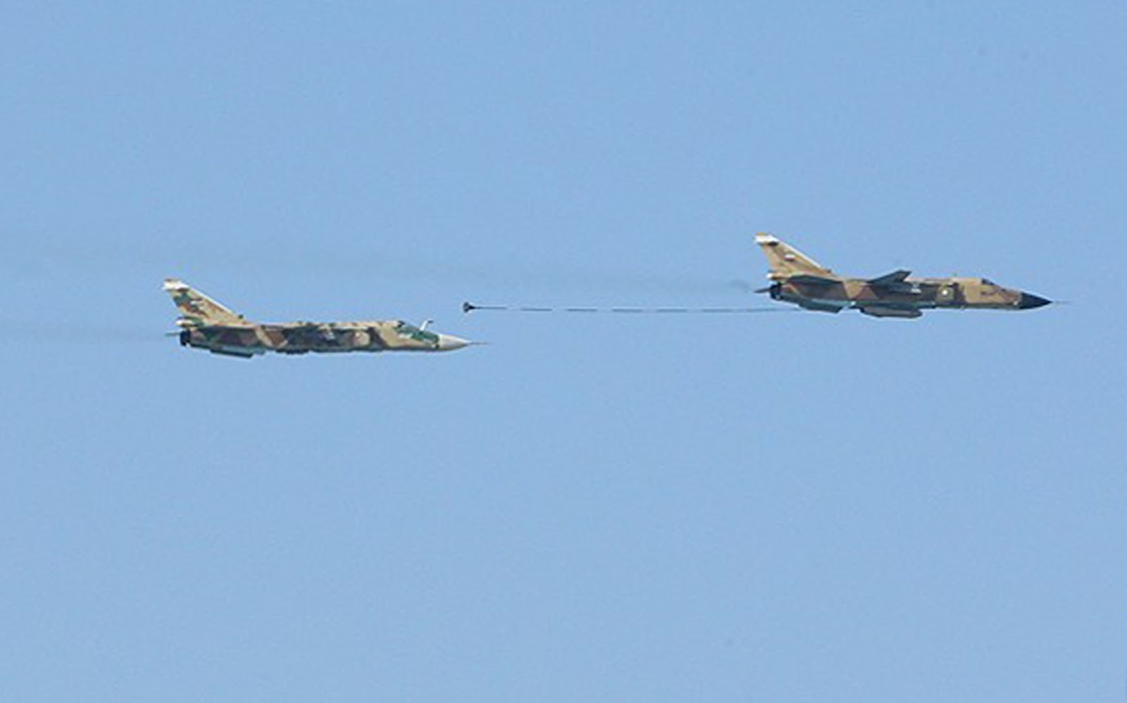 Two+IRIAF++Islamic+Republic+of+Iran+Air+Force+%2528IRIAF%2529++Su-24MKs+demonstrate+the+Upaz-A+%2527buddy%2527+air-to-air+refuelling+Iran%2527s+Army+Day+in+2012+fighter+jets+ground+attack+%25282%2529.jpg