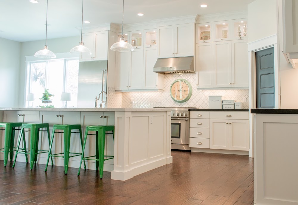 white kitchen with pops of green