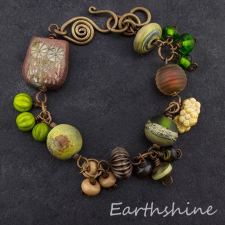 http://earthshine.indiemade.com/product/antique-copper-lampwork-and-czech-glass-owl-bracelet?tid=3