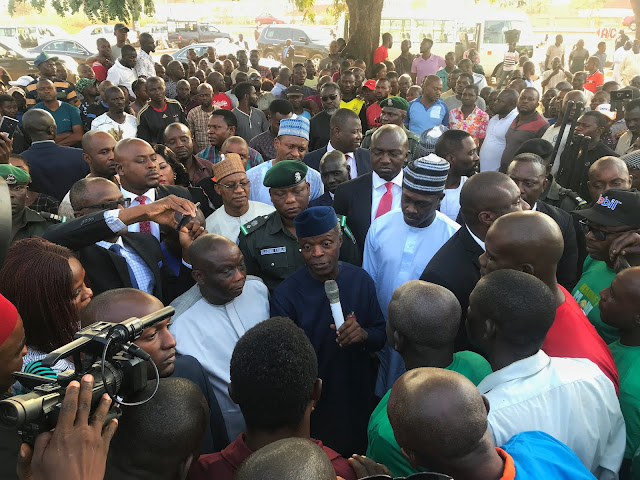 Image result for Osinbajo visits Apo market artisans, mechanics