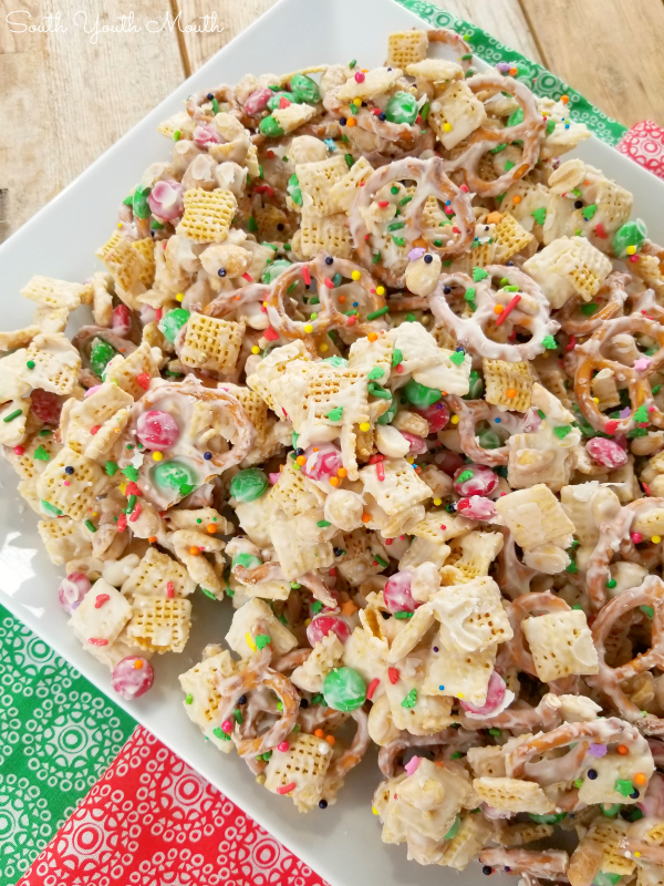 A sweet and salty snack mix made with chex cereal, pretzels, peanuts and M&M’s coated with white chocolate perfect for Christmas, other holidays or just for a sweet treat (also called Christmas Crack)!