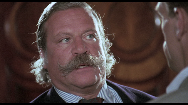 Hired to Kill screen cap Oliver Reed