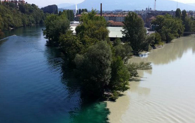 The confluence of the River Rhone and Arve River in Geneva, Switzerland The confluence of the River Rhone and Arve River in Geneva, Switzerland