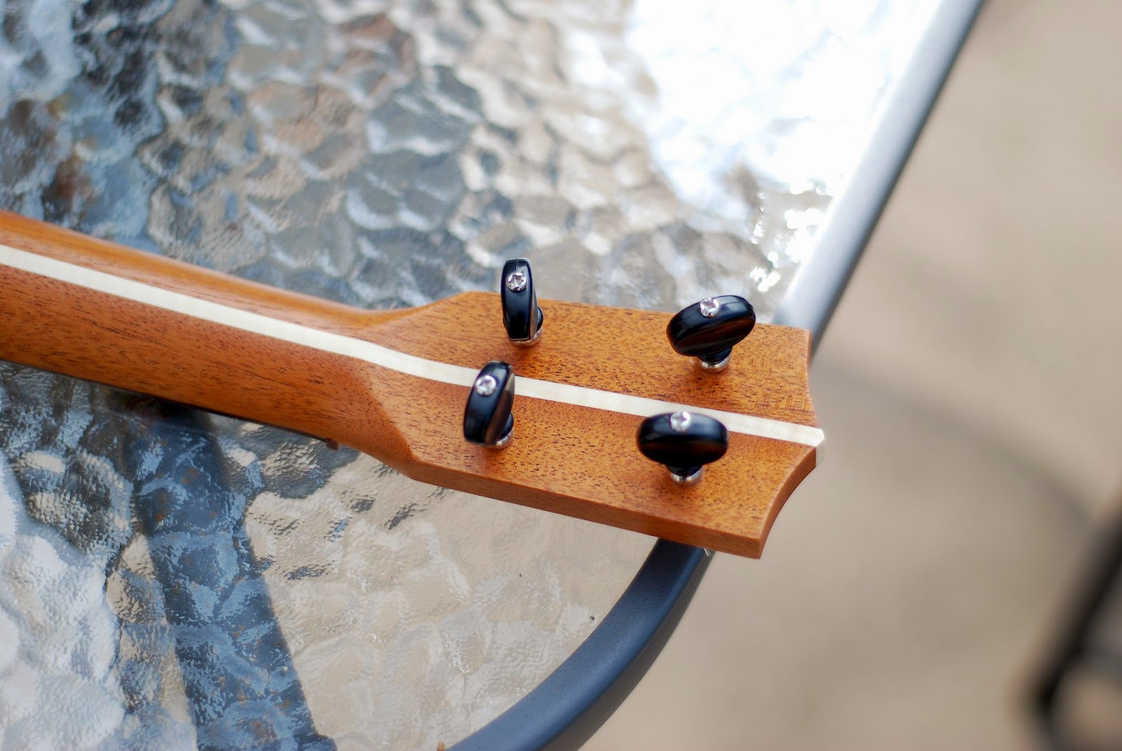 Playing A Ukulele In Tune With Itself
