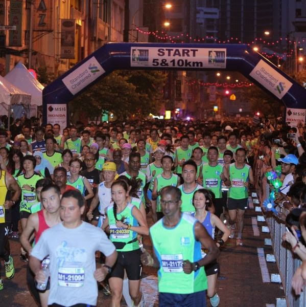 RUNNING WITH PASSION Press Release Standard Chartered KL Marathon