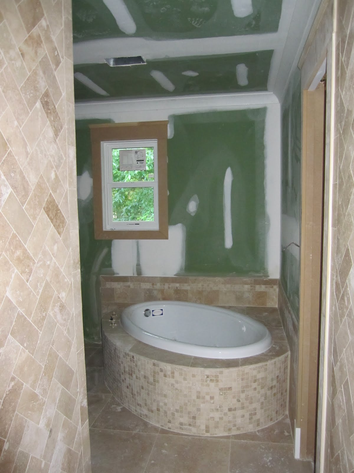 Brookhaven Renovation Master Bathroom tile complete!