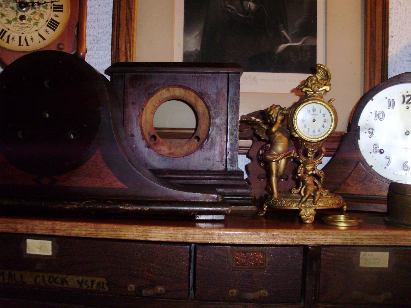 Log Cabin Antiques & Gifts Assorted clock housings and clocks