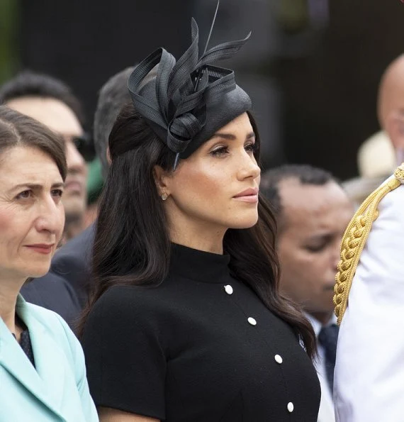 Meghan Markle, wearing an elegant Emilia Wickstead wool crepe dress and Philip Treacy hat. Aquazzura Deneuve pow pointy poe pump