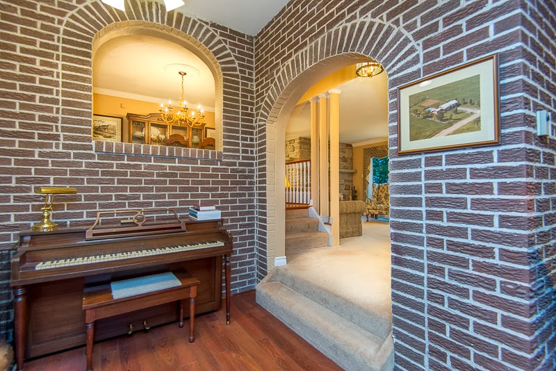 The Stuart Sinclair Team Timeless design amidst a picturesque backdrop!