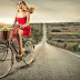 Lady Ride a Cycle in Alone