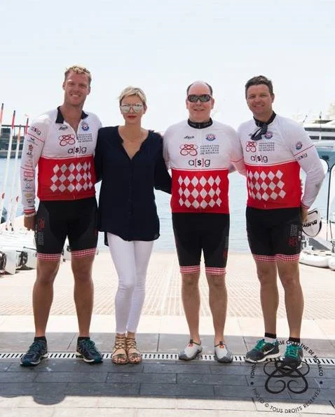 Prince Albert and Princess Charlene attended Riviera Water Bike Challenge at Monaco Yacht Club. Princess Charlene a injury in her wrist.