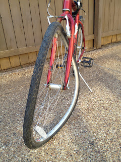 bent bicycle rim and wheel