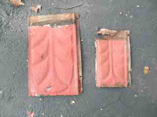 Red metal shingles in two sizes from 1870s home in South Carolina