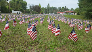 flags placed on the lawn at the Elks Lodge on Ponds St to remember 9/11 victims