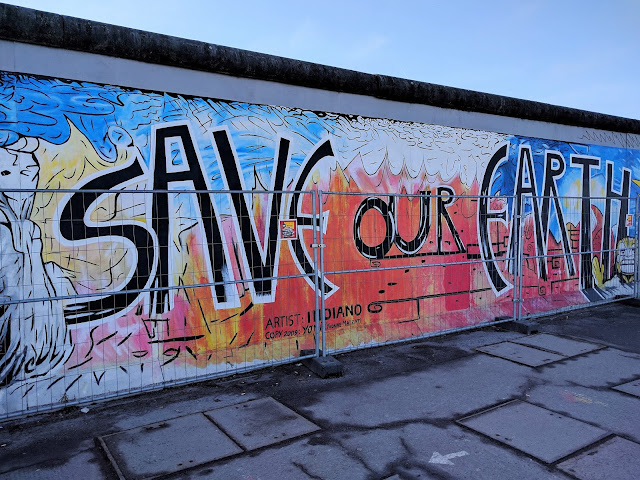 East Side Gallery East Side Gallery - painted wall saying "save the earth"