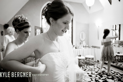 Bride getting dressed in Bridal Room at Chase Court in Baltimore