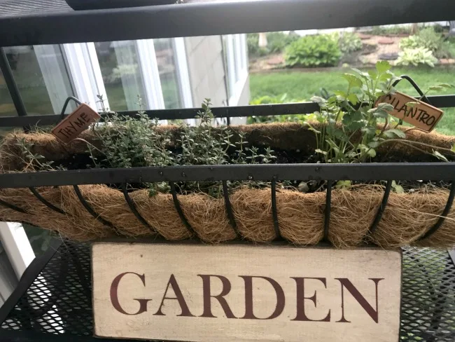 DIY garden sign for a baker's rack herb garden