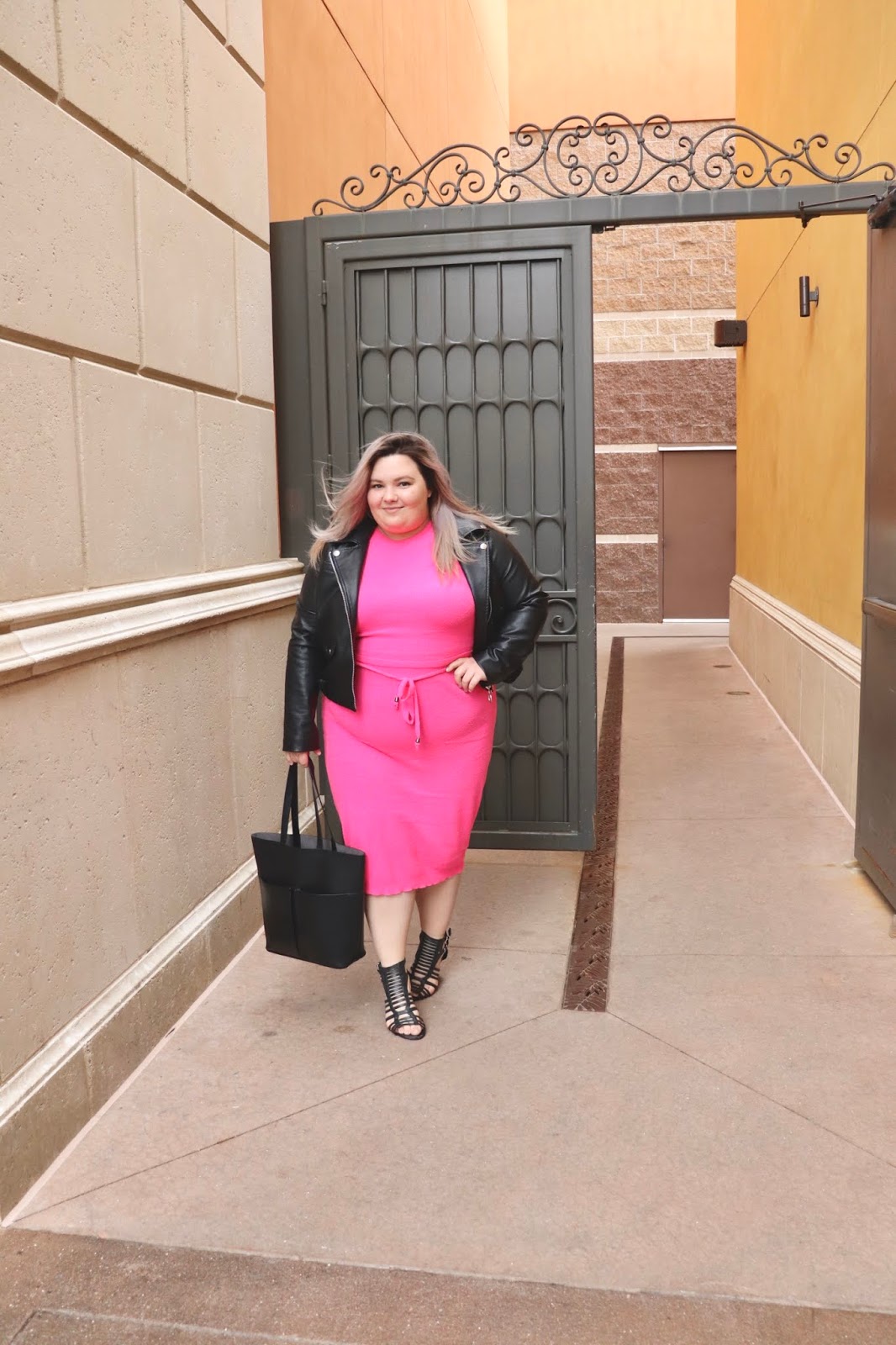 Chicago Plus Size Petite Fashion Blogger, YouTuber, and model Natalie Craig, of Natalie in the City, review's Fashion Nova's neon sweater dresses.