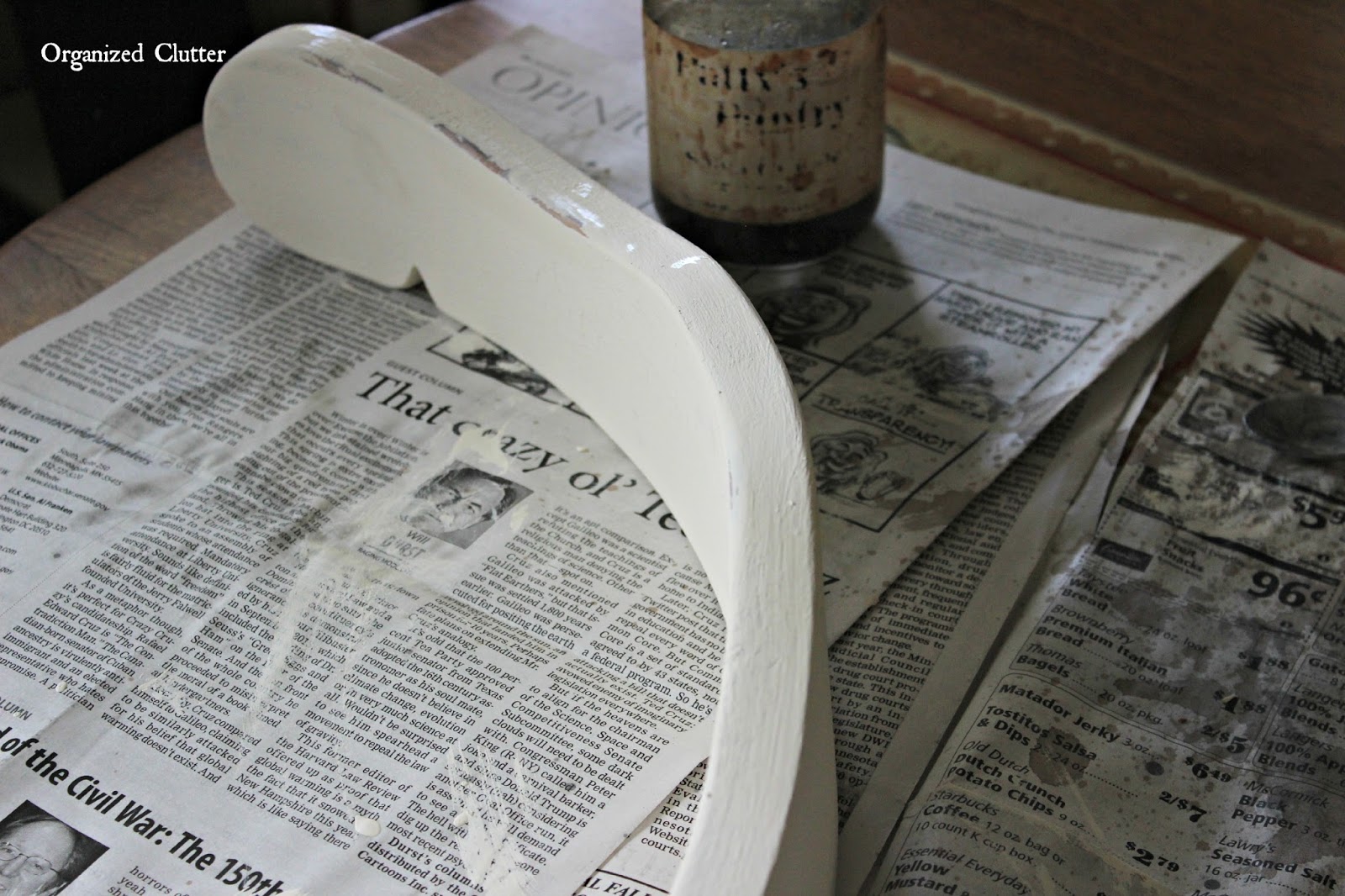 A RePurposed Chair Back Photo Hanger Organized Clutter