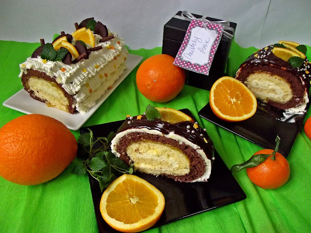 Ruladă duo cu jeleu de portocale şi cremă de lapte