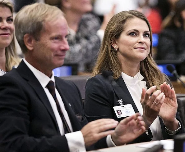 Princess Madeleine attended the seminar of World Childhood Foundation in New York. Madeleine wore bespoke woman pantsuit fashions, style