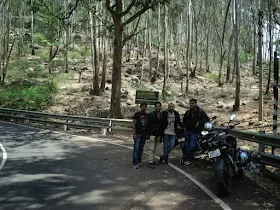 The group relaxing on a boulder at the Yelagiri summit