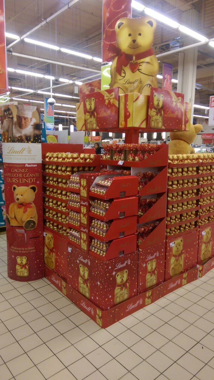 A Lindt product display, showcasing the application of theatricalization in a retail setting, where the Alex Lyon contract can facilitate partnerships between suppliers and retailers