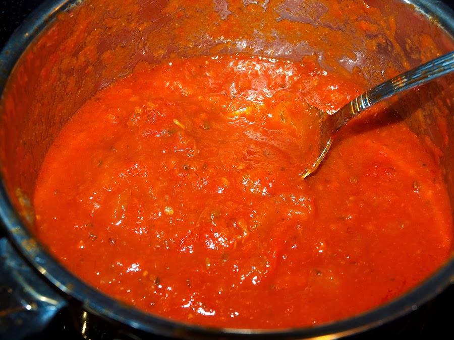 Pellet Smoker Cooking Porkiladas with red and green sauce over rice