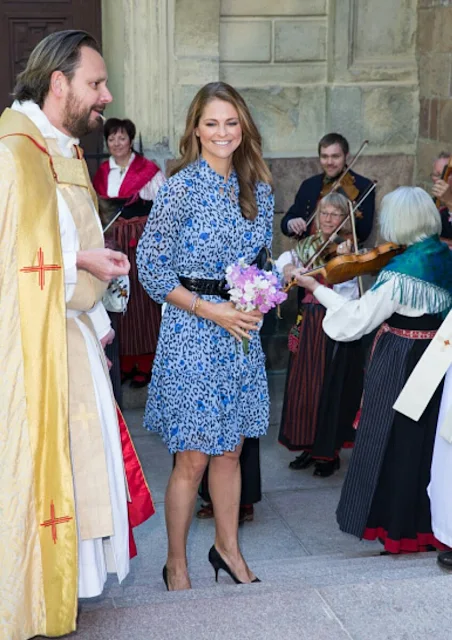 Princess Madeleine of Sweden attends Jarvsomassan a folk fair for musicians Hedvig Eleonora Church in Östermalm. Princess Madeleine wore Alice Temperley Leopard Print Dress