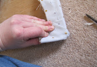 Step 32: Fold halfway and staple.