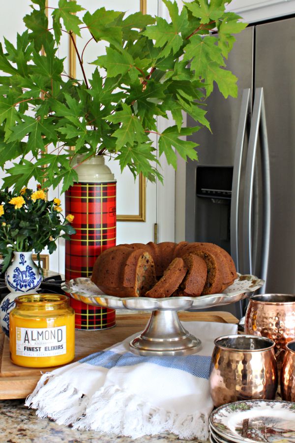 easy pumpkin bread with raisins and walnuts, vintage plaid thermos, blue and white