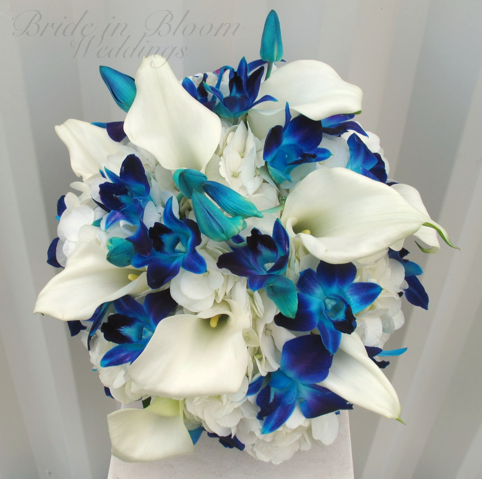 Bride in Bloom Blue orchid bouquet