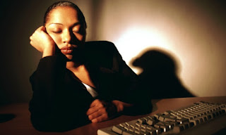 Tired, exhausted employee sleeping in the office