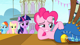 Pinkie's friends look on, disturbed, as Twilight talks to her as she is laying on her side, stroking the yovidaphone.